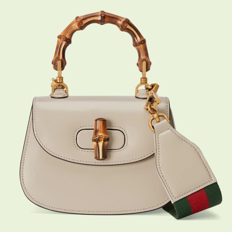 G*u*i top handle bags